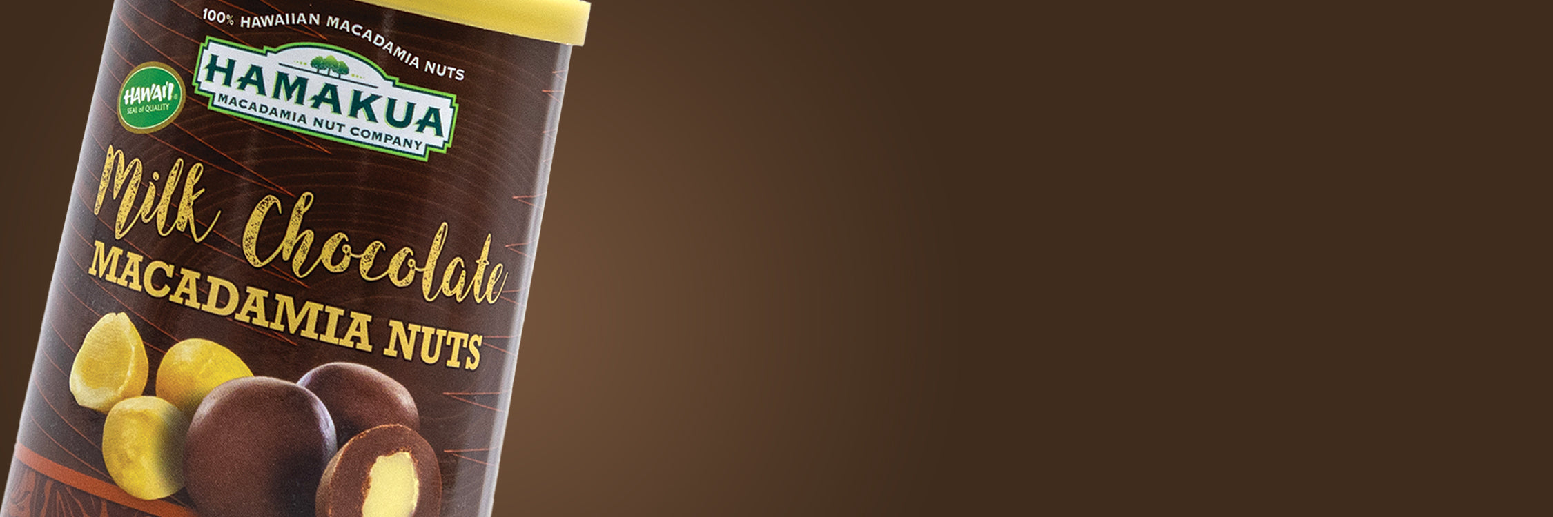 Can of Hāmākua Macadamia Nut Company Milk Chocolate Macadamia Nuts on a gradient brown background