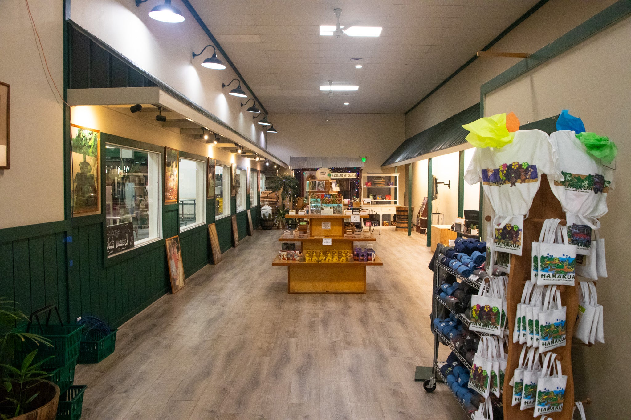 Hāmākua Macadamia Nut Company Visitor Center viewing gallery and retail shelves