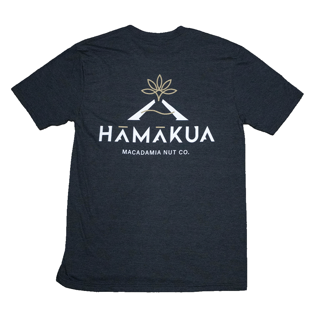 Back of a dark gray t-shirt with a white Hāmākua Macadamia Nut Co logo